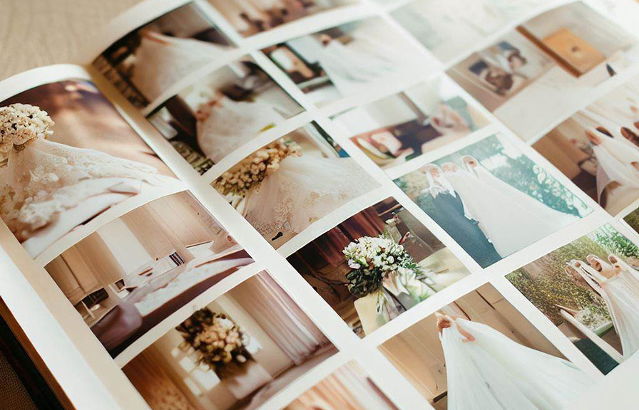 Wedding album open to page with beautiful photos
