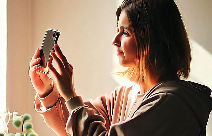 Person taking product photo with smartphone using natural light