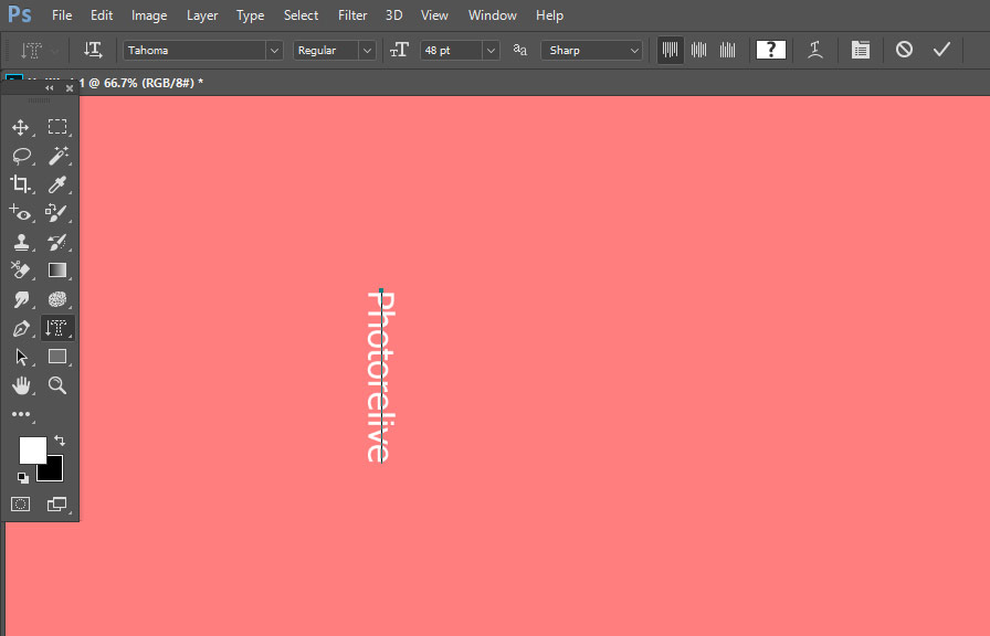 Person using the Vertical Type Mask Tool in Adobe Photoshop to create vertical text