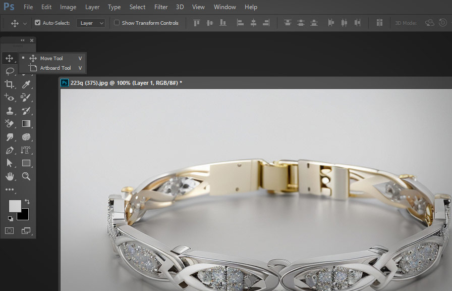 Person using Move Tool in Photoshop to move object